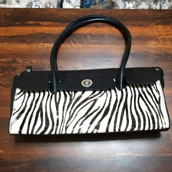 Pelle Studio Handbags - Pelle studio leather bag, Medium, zipper on top ,front pocket magnetic button.